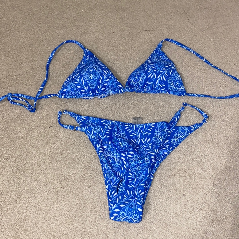 NEVER WORN: blue and white bikini.